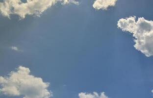 Image of clear blue sky and white clouds on day time for background usage photo