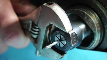 hands of engineer prepare copper bars for drill. metalworking industry. close up hole drilling in copper bars for electrical connection on lathe boring machine with lubricant video