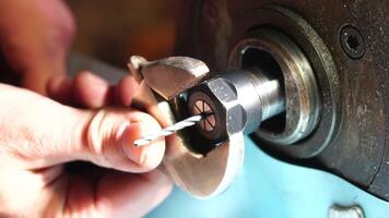 metalworking industry. close up hole drilling in copper bars for electrical connection on lathe boring machine with lubricant video