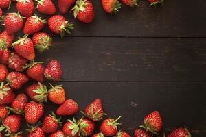 AI generated Retro sweetness Strawberries displayed on a black wooden vintage background photo