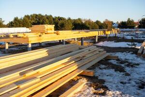 The foundation of a wooden frame house on stilts is a construction site, the process of building a frame photo