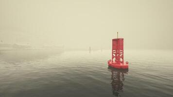 Red Metal Buoy Floating on Cold Norwegian Sea video