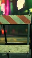 A wooden sign sitting on the side of a road video