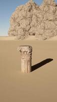 A stone pillar in the middle of a desert video