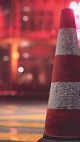 A traffic cone sitting on the side of a road video