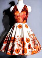 AI generated Fashionable evening orange summer dress on a mannequin. ai generative. ai generative photo