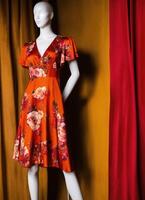 AI generated Fashionable evening orange summer dress on a mannequin. ai generative. ai generative photo