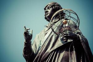 Monument of great astronomer Nicolaus Copernicus, Torun, Poland photo