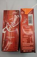 Sulawesi, Indonesia, January 21st, 2023. Sosro bottle tea, packaged tea drink, one of the popular drink brands in Indonesia in a red box. Sometimes served during Ramadan or Eid al-Fitr photo