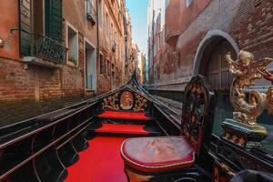 Classic Venice Gondola Scene Serene Canal with Gondolier Steering Traditional Boat photo