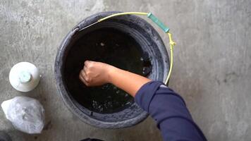 A farmer is making traditional pesticide for his farm video