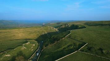 Scenic aerial footage of the cars driving through mountains video