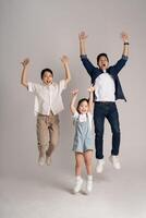 Asian family portrait posing on white background photo