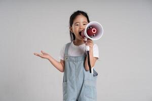 Portrait of a lovely Asian baby girl posing on a white background photo