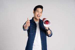 Portrait of Asian man posing on white background photo