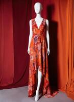 AI generated Fashionable evening orange summer dress on a mannequin. ai generative. ai generative photo