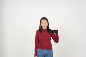 Young Asian woman in Red t-shirt Smiling and Showing blank screen isolated on white background photo