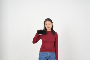 Young Asian woman in Red t-shirt Smiling and Showing blank screen isolated on white background photo