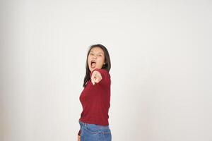 Young Asian woman in Red t-shirt Pointing at You with angry gesture isolated on white background photo