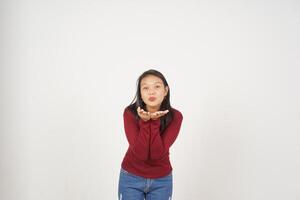 Young Asian woman in Red t-shirt Blowing Kiss isolated on white background photo