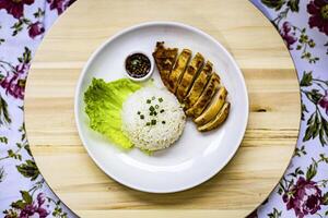 Grilled Chicken Breast with Rice On The Table photo