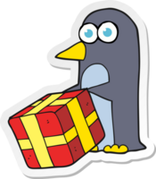 adesivo di un pinguino cartone animato con regalo di Natale png