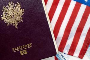 France passports on Euro currency U.S. flag photo