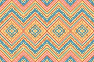 ethnic seamless pattern with a geometric flower design blue orange yellow design for print textile carpet vector