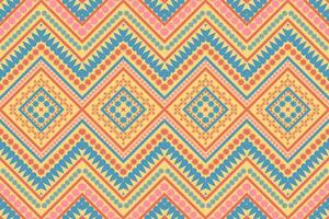 ethnic seamless pattern with a geometric flower design blue orange yellow design for print textile carpet vector