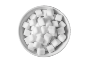 ai généré blanc sucre cubes dans une bol png