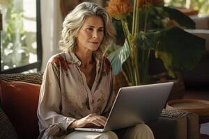 AI generated Senior woman using laptop while sitting on sofa in loft interior of living room photo