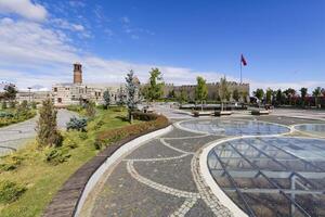 Reflections in the glass grounded Kale city park and Erzurum byzantine castle, Anatolia, Turkey photo