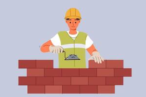 Man bricklayer builder builds brick wall using trowel with concrete mixture to secure blocks vector