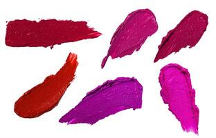 Various lipstick swatch stroke isolated on white photo