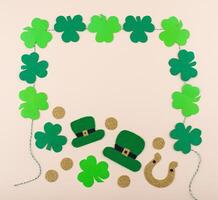 St. Patrick's Day concept with leprechaun hat, gold coins and horseshoe photo