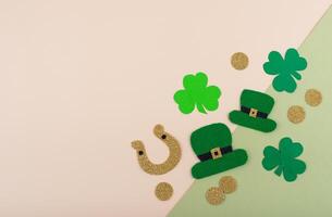St. Patrick's Day concept with leprechaun hat, gold coins and horseshoe photo