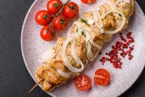 Delicious fresh chicken meat kebab with salt, spices and herbs photo