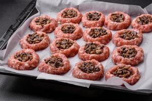 Delicious baked meat boats with mushrooms, cheese, salt and spices photo