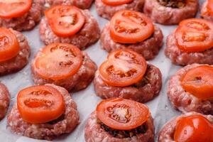 Delicious baked meat boats with mushrooms, cheese, salt and spices photo