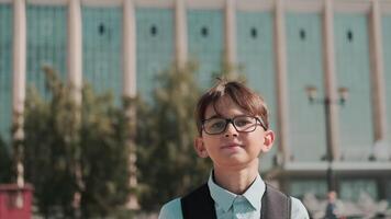 Online education, Back to school, Happy schoolboy, Learn lessons. Schoolboy with a backpack goes to school video