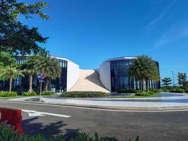 MAKASSAR, INDONESIA - FEBRUARY 7th, 2023 - the building is surrounded by trees and bushes at Center point of Indonesia Makassar photo