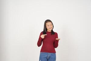 Young Asian woman in Red t-shirt Showing and holding on open palm copy space isolated on white background photo