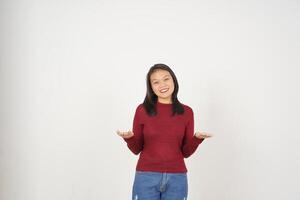Young Asian woman in Red t-shirt Showing and holding on open palm copy space isolated on white background photo