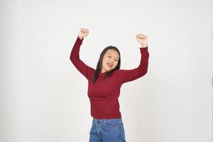 Young Asian woman in Red t-shirt Just dance isolated on white background photo