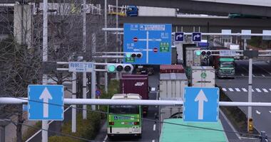 A traffic jam at the city street in Tokyo telephoto shot video