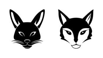 Set of black silhouettes of hare heads. Rabbit vector illustration.