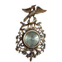 antiguo bronce pared reloj con águila emblema png