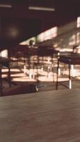 View to classroom with tables and small blackboard and grungy walls video