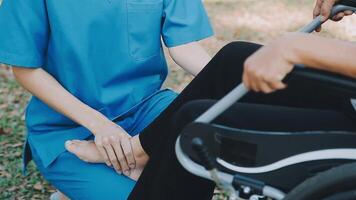 young asian physical therapist working with senior woman on walking with a walker video