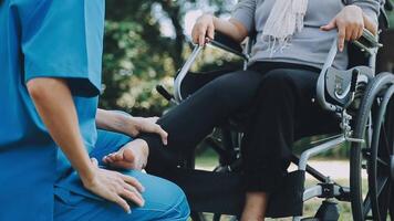 young asian physical therapist working with senior woman on walking with a walker video